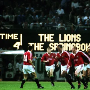 Jeremy Guscott celebrates scoring the series-winning drop-goal for the British Lions in 1997