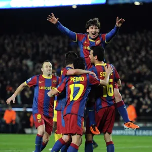 Lionel Messi celebrates with his Barcelona teammates