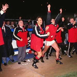 The Manchester United bench celebrate after reaching the 1990 FA Cup Final