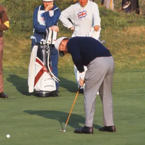 Miller Barber putts during the 1969 Ryder Cup