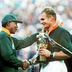 South Africa Captain Francois Pienaar receives the Rugby World Cup Print South Africa Captain Francois Pienaar receives the Rugby World Cup Print