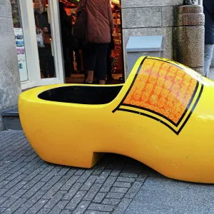 Giant wooden souvenir clog outside a souvenirs shop for clogs in Amsterdam, Holland