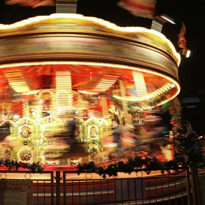 Motion blur view of a Merry go round carousel in London