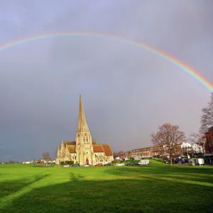 Seasonal weather - Rainbow over All Saints Church, Blackheath, London, UK