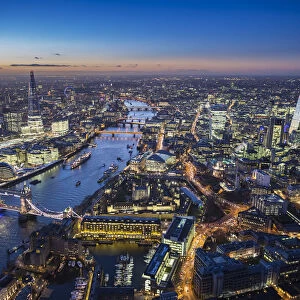 Aerial view of The Shard, River Thames, Tower Bridge and City of London, London, England