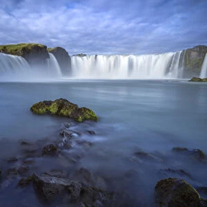 Beautiful Godafoss waterfall against cloudy sky, Northern Iceland, Iceland