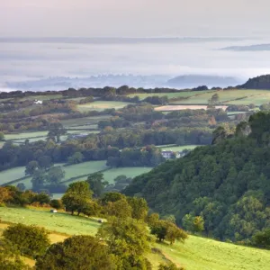 Carreg Cennen Castle at dawn on a misty summer morning, Brecon Beacons National Park