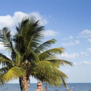 Central America, Belize, Stann Creek, Hopkins village, a model on the beach in Hopkins