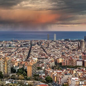 City skyline with stormy sky at sunset, Barcelona, Catalonia, Spain
