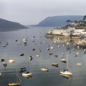 Early morning sunlight on Salcombe and the yachts in Kingsbridge Estuary, South Hams