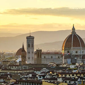 Florence Cathedral (Duomo di Firenze) and buildings in the old town at sunset, Florence