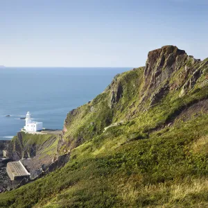 Hartland Point Lighthouse and Lundy Island on the horizon, Devon, England. Summer (September) 2010