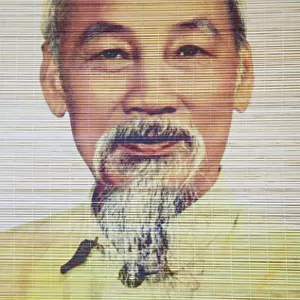 Ho Chi Minh portrait on bamboo scroll, Hanoi, Vietnam