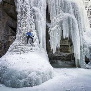 Ice Climber on the Queen Frozen Waterfall, Maligne Canyon, Jasper National Park, Alberta