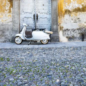 Iconic Lambretta Innocenti scooter in the old town, Morbegno, province of Sondrio