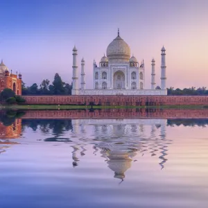 India, the Taj Mahal mausoleum reflecting in the Yamuna river at sunset