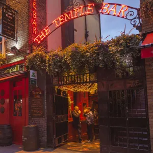 Ireland, Dublin, Temple Bar area, traditional pub exterior, The Temple Bar Pub, dusk