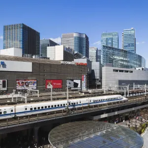 Japan, Honshu, Tokyo, Yurakucho, Skyline and Shinkansen Bullet Train