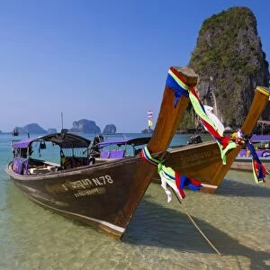 Longtail boats on Phra Nang beach, Railay Peninsula, Krabi Province, Thailand