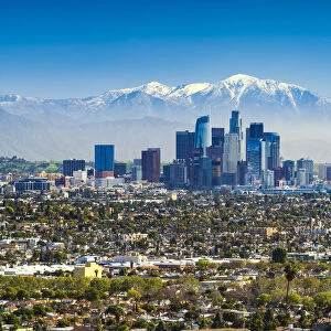 Los Angeles Skyline and Snow Capped San Gabriel Mountains, California, USA