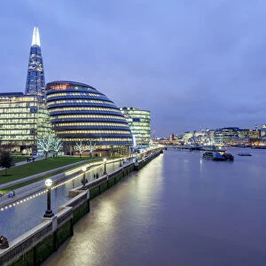Modern Architecture by the Queens Walk and The Shard at twilight, London, England