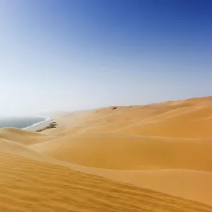 Namib desert meets the ocean, Sandwich Harbour, Swakopmund, Namibia, Africa