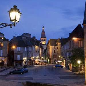 A night time cafe scene on the main square in Sarlat France