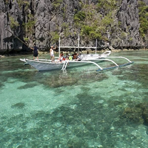 Outrigger boat in lagoon, El Nido, Palawan Island, The Philippines