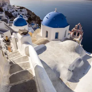 Picturesque sunrise view in Oia, Santorini, South Aegean, Greece