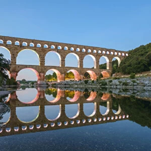Pont du Gard Roman aqueduct over Gard River at dusk, Gard Department, Languedoc-Roussillon
