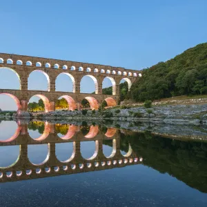 Pont du Gard Roman aqueduct over Gard River at dusk, Gard Department, Languedoc-Roussillon