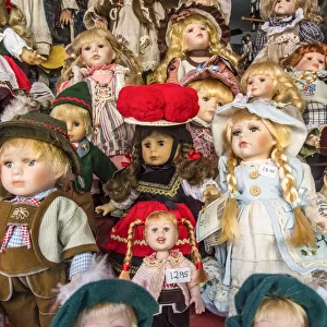 Porcelain dolls on display in a shop window, Rothenburg ob der Tauber, Bavaria, Germany
