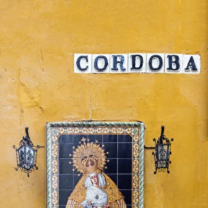 Religious icon tile work of the Virgin Mary or Madonna in a street of Seville, Andalusia