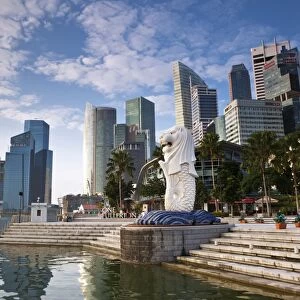 Singapore, Singapore, Marina Bay. The Merlion Statue with the city skyline in the background