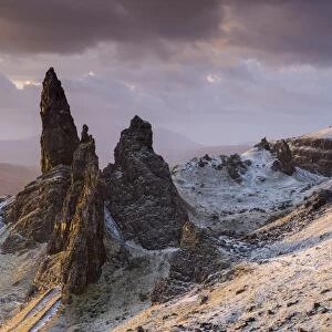 Snow dusted Old Man of Storr at sunrise, Isle of Skye, Scotland. Winter (December) 2013