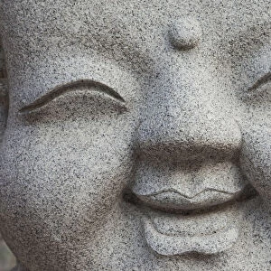 South Korea, Seoul, Jogyesa Temple, Facial Detail of Stone Buddha Carving