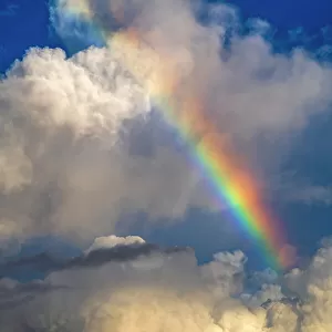Thunder cloud and rainbow, Praslin, Seychelles