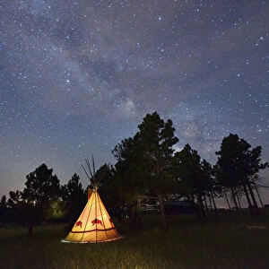 Tipi camp at night, Lakota Sioux Tipis, Custer County, Black Hills, Western South Dakota