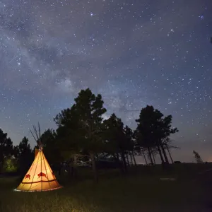 Tipi camp at night, Lakota Sioux Tipis, Custer County, Black Hills, Western South Dakota