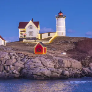 USA, Maine, York Beach, Nubble Light lighthouse, dusk