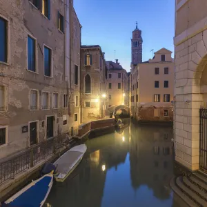 A venetian water canal at dusk, Venice, Veneto, Italy