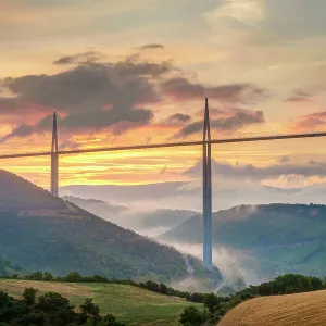 Viaduc de Millau bridge over Tarn river valley at sunrise, Millau, Aveyron Department