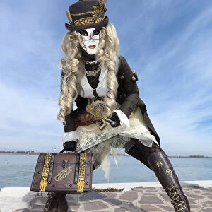 Woman in Steampunk costume posing during Carnival on Burano Island, Venice, Veneto, Italy