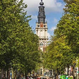 Zuiderkerk Belltower reflecting in the canal in Amsterdam, Holland / Netherlands
