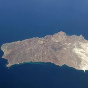 An aerial view of Isla San Marcos off the Baja Peninsula on the Gulf of California (Sea of Cortez) side. Baja California, Mexico. Note the dock and white gypsum mine operation on the lower (SW) side of the island