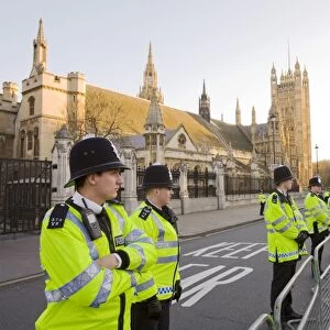 Police protecting the House of Parlaiment from climate change protestors on a rally in Parliament Square in December