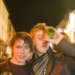 young men binge drinking and having a good night out in Lancasrter UK