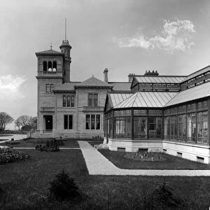 View of the entrance front and conservatory at Seafield House, Ayr. Date: 1890