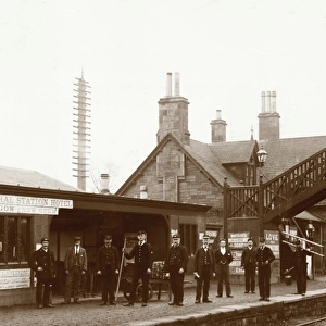 View of group of station workers, likely at Stanley Junction Station, Perthshire Date