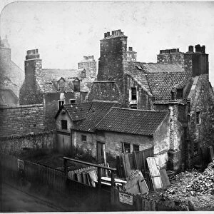 View of houses at the head of College Wynd, Edinburgh, prior to demolition. Date: 1871